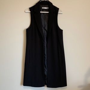 Ricki’s black long vest